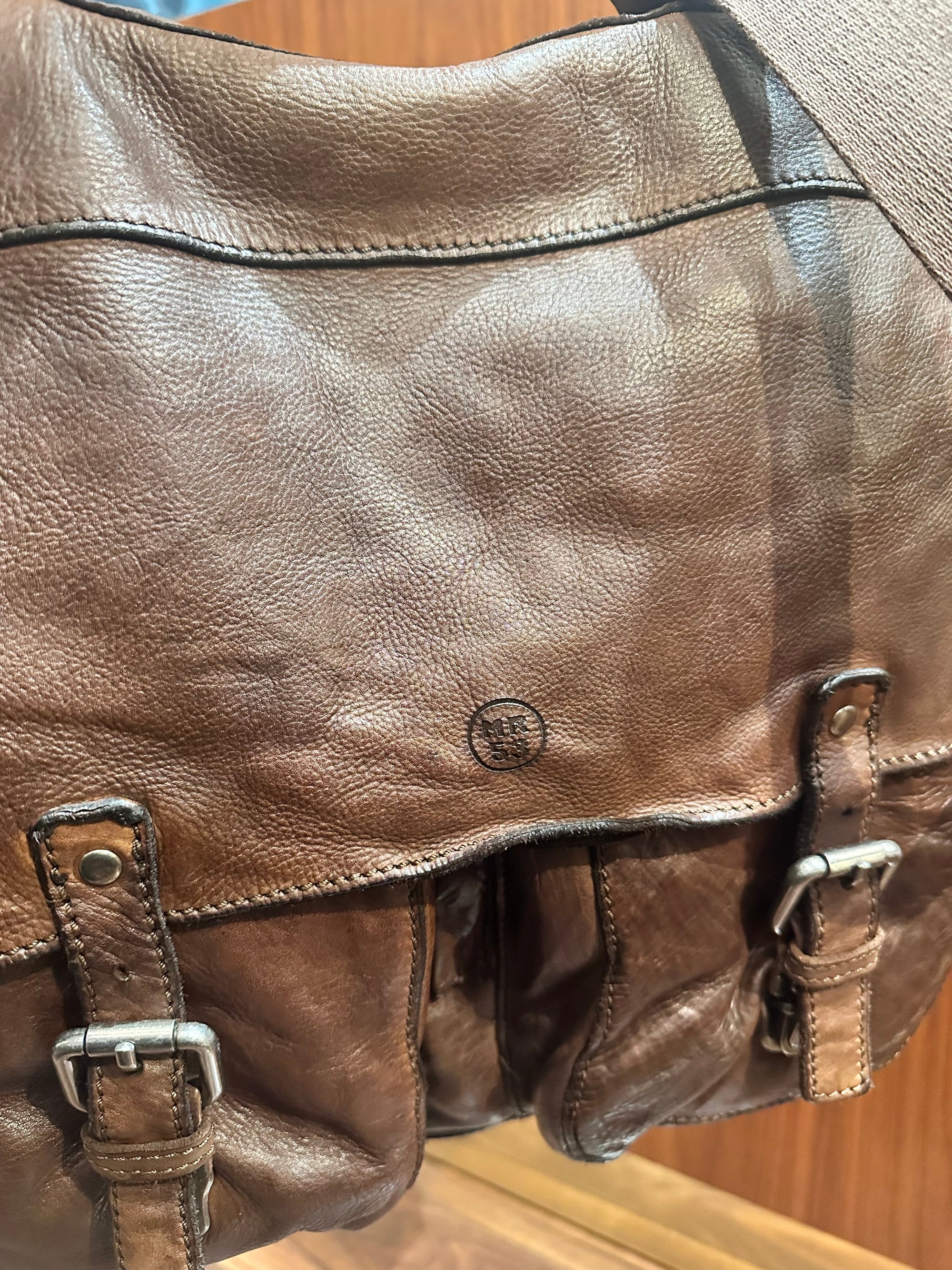 MINORONZONI. Cartella in pelle testa di moro. COD.527